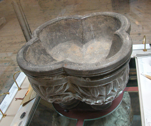 Holy water stoup, made of Nidderdale marble, c.1220-50, from Fountains Abbey