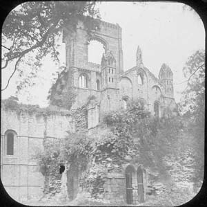 The north transept of the church at Kirkstall Abbey showing the buttress constructed to support the remainder of the crossing, which was damaged by the partial collapse of the tower in 1779. This buttress and the surrounding vegetation were removed during the programme of conservation in 1892-6.
